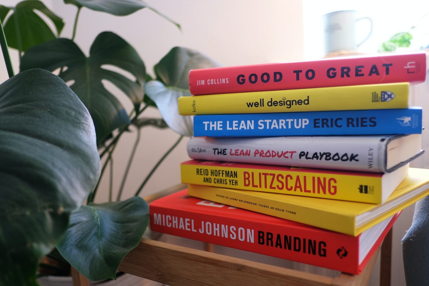 books on brown wooden shelf